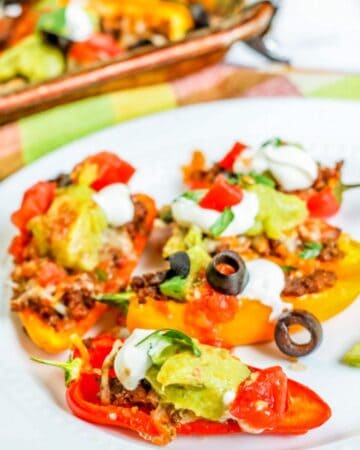bell pepper nachos with olives on white plate